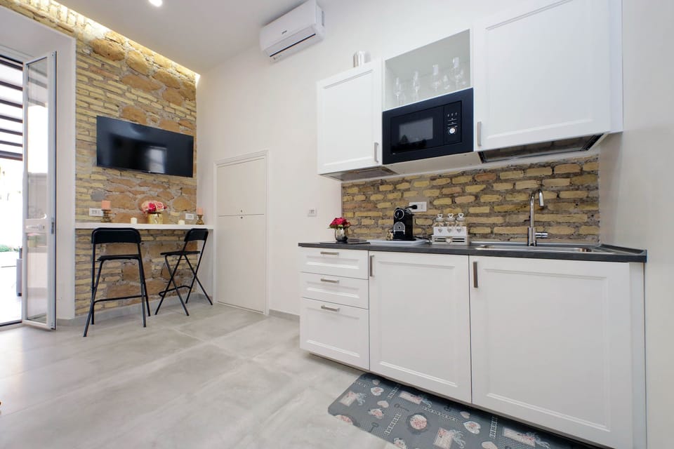 Full-size fridge, microwave, stovetop, espresso maker