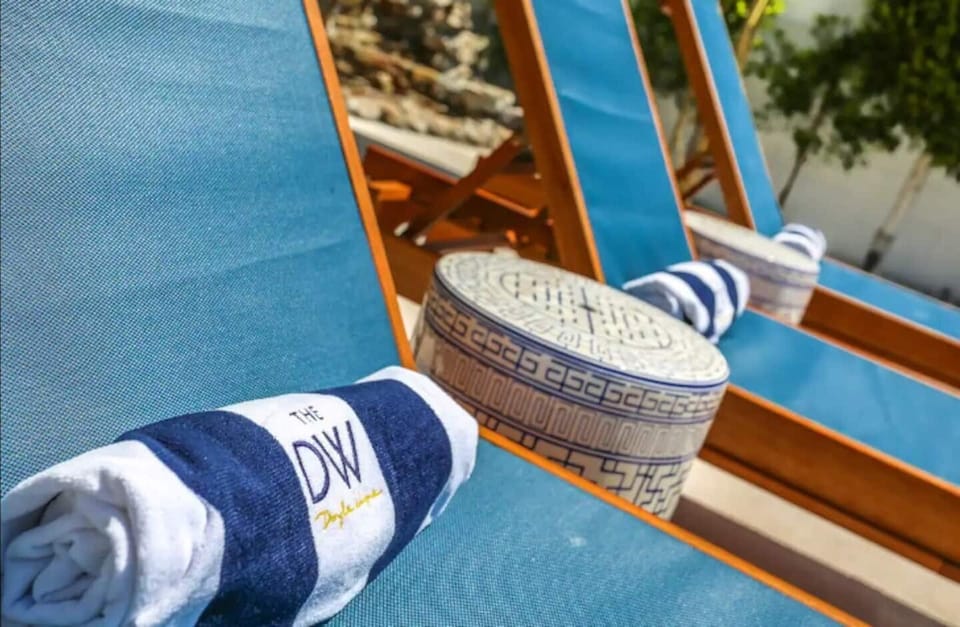 Fresh pool towels provided for your comfort and convenience by the poolside.