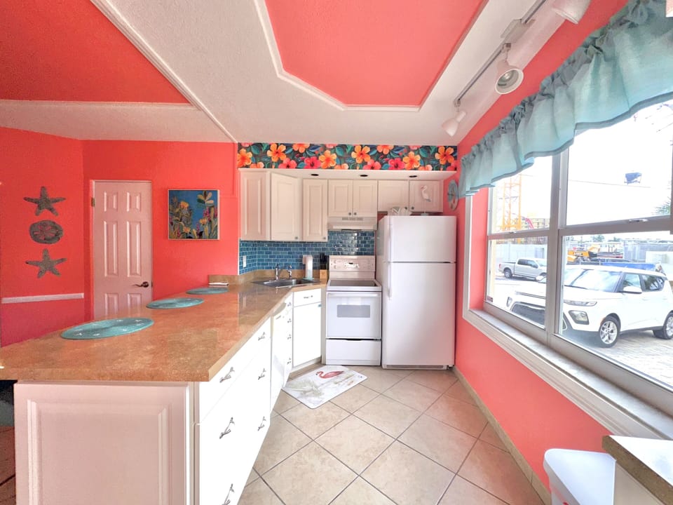 full kitchen and utensils for cooking