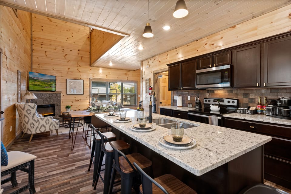 Room for the whole family in this open kitchen, dining, and living room area.