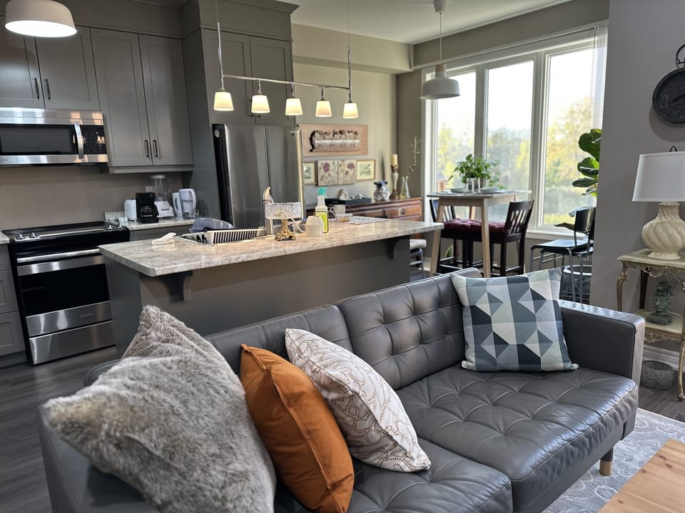 Open concept kitchen, dining and living room.