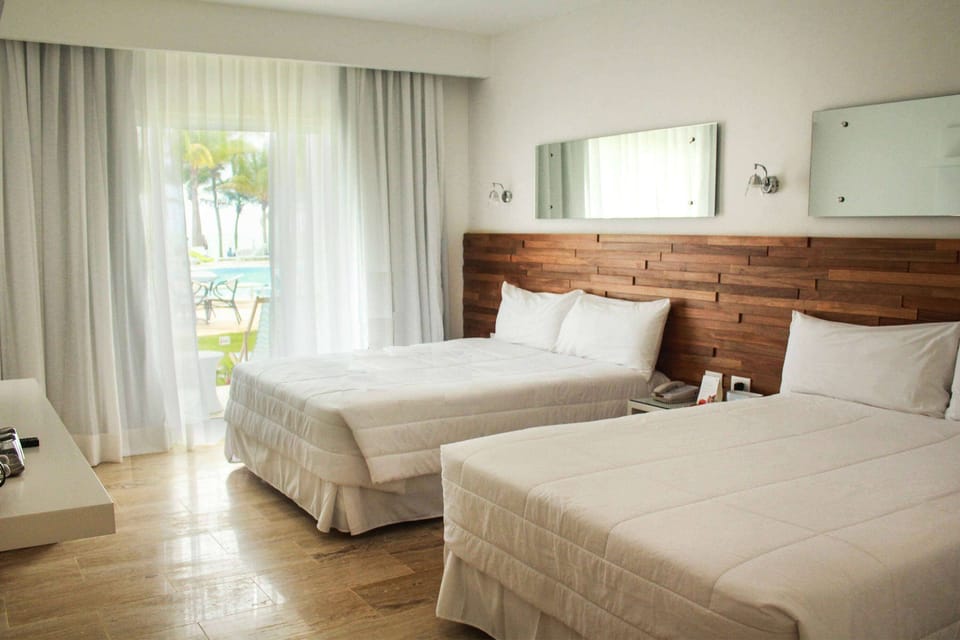 Superior Ocean, 2 Queen Beds, Non-Smoking | Minibar, in-room safe, laptop workspace, iron/ironing board