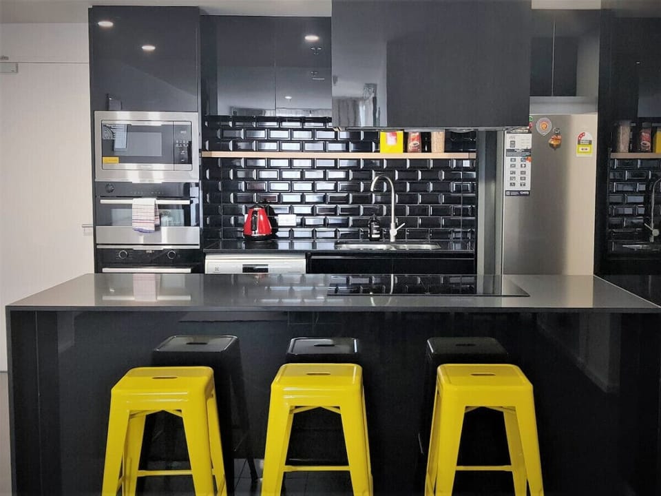 Our fully-equipped kitchen features modern appliances, ample counter space, and a cosy dining area, making it ideal for family meals and gatherings.