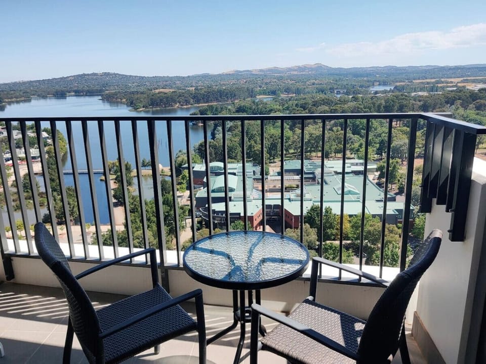 Our balcony offers comfortable seating for two, complete with a table and breathtaking views. A perfect setting for a glass of wine or simply soaking in the surroundings.