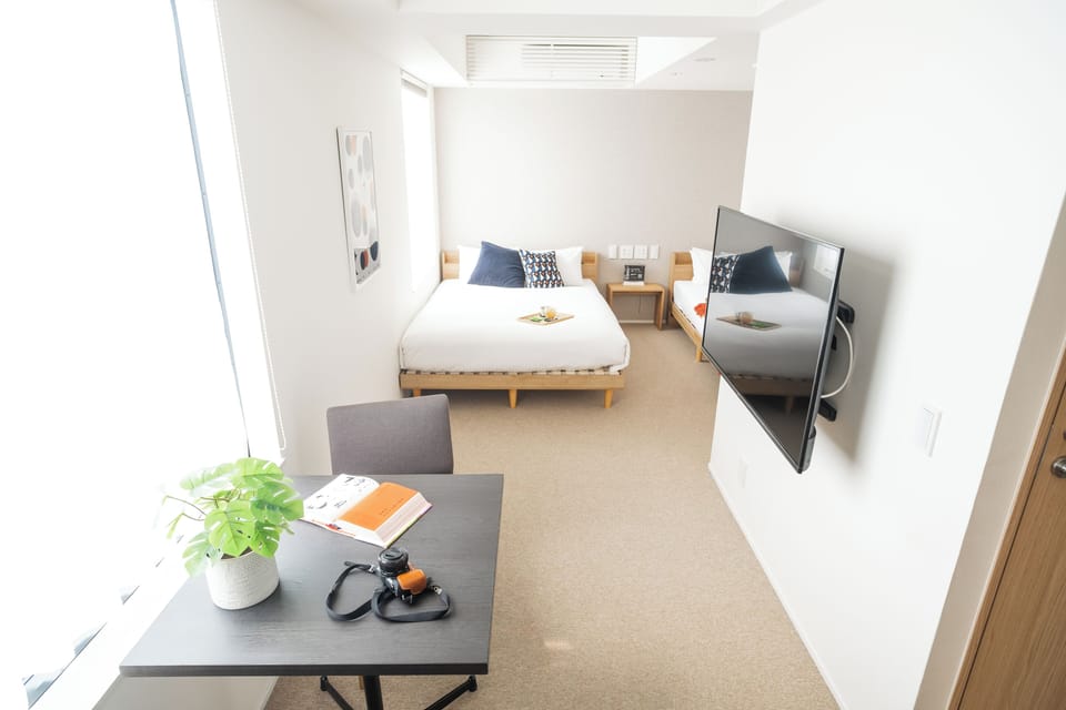 Studio 40 Double (Non smoking) | Living area | 95-cm flat-screen TV with satellite channels