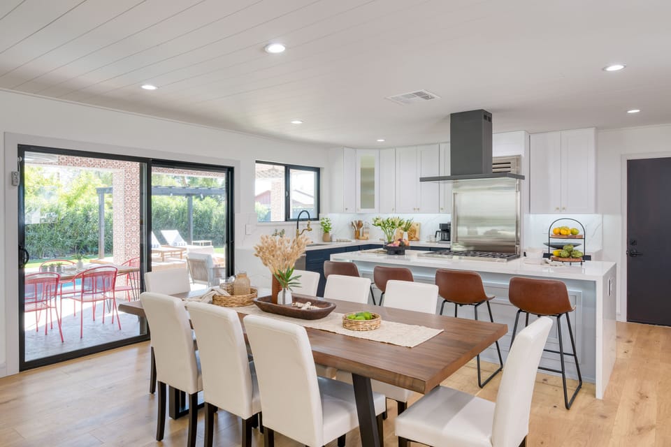 Additional barstool seating at the kitchen island.