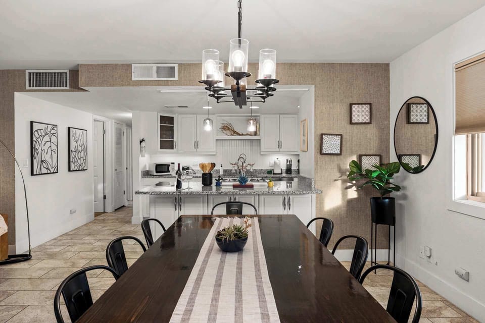 Modern chandelier lighting sets the mood for memorable meals together.