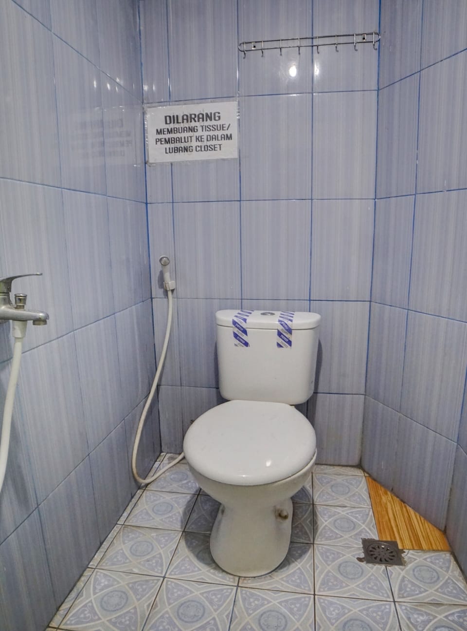 Shower, towels, toilet paper