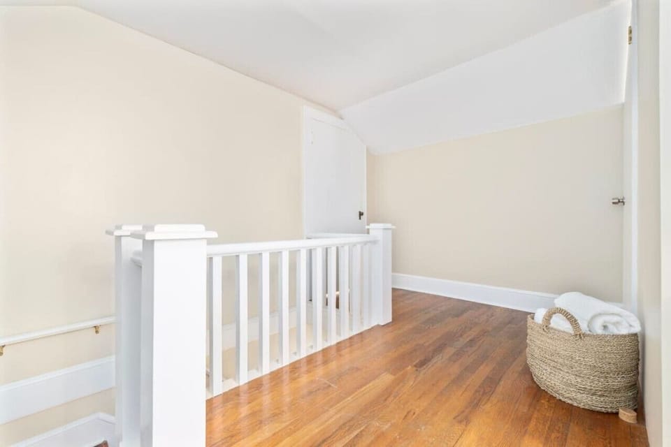 The charming landing, featuring a cozy reading nook for quiet moments.