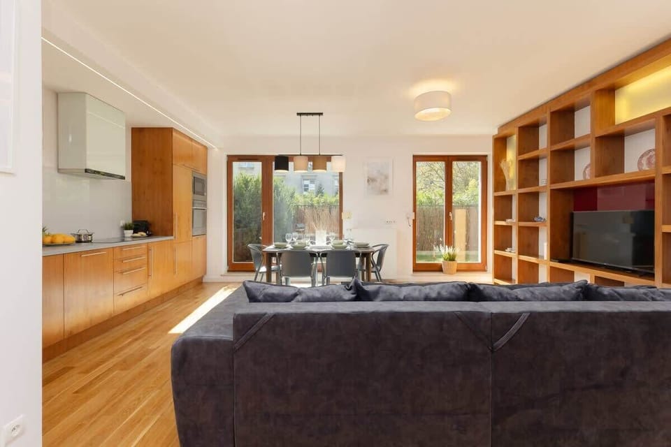 Living room with a comfortable sofa and TV. 