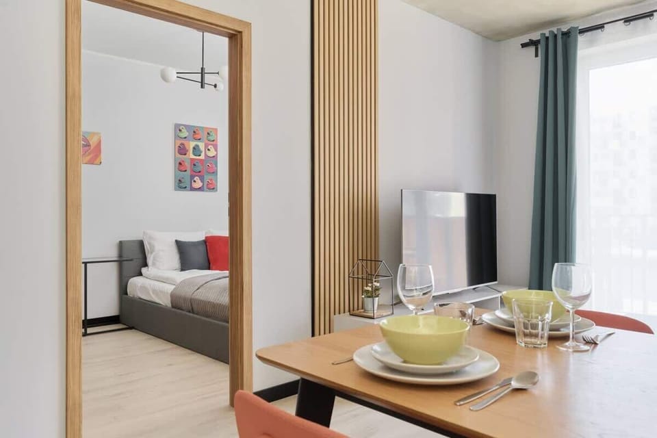 Large table with chairs for eating communal meals. 