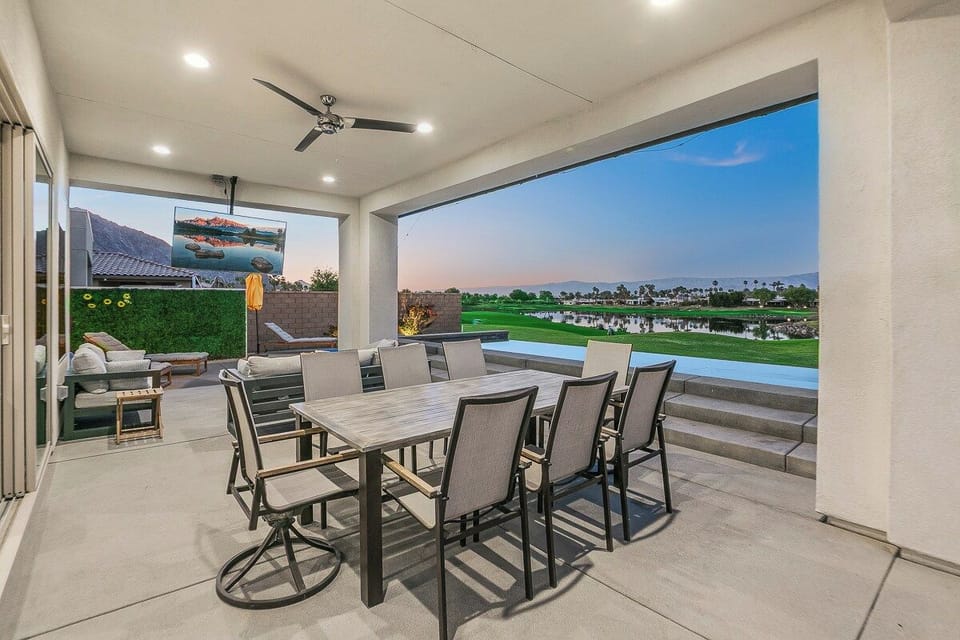 Dine alfresco with 18th hole views.