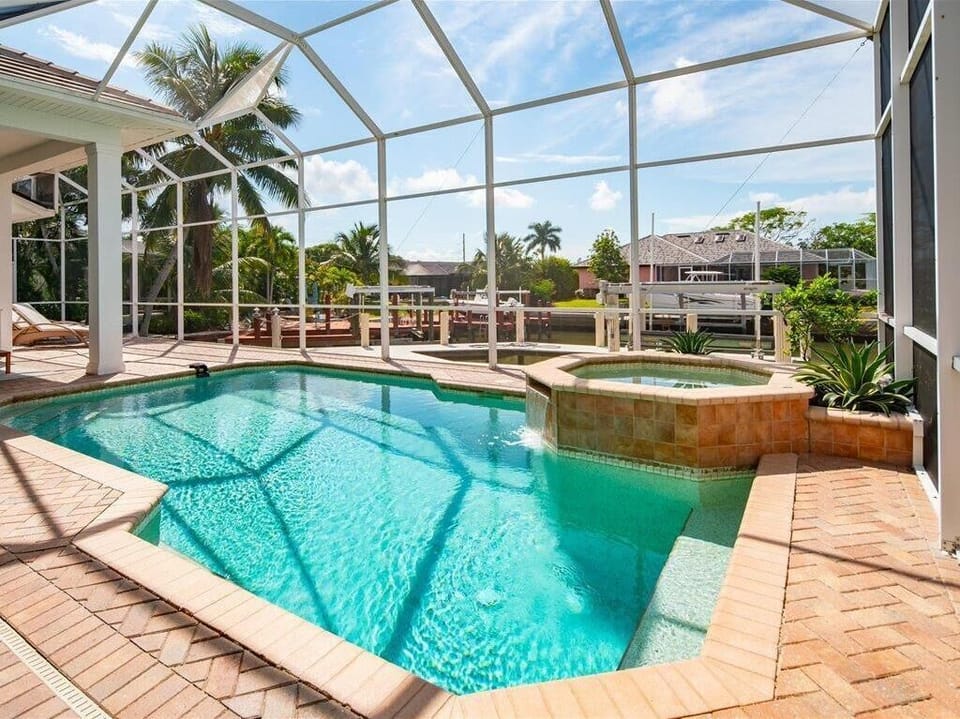 Sparkling Pool with Spill Over Spa