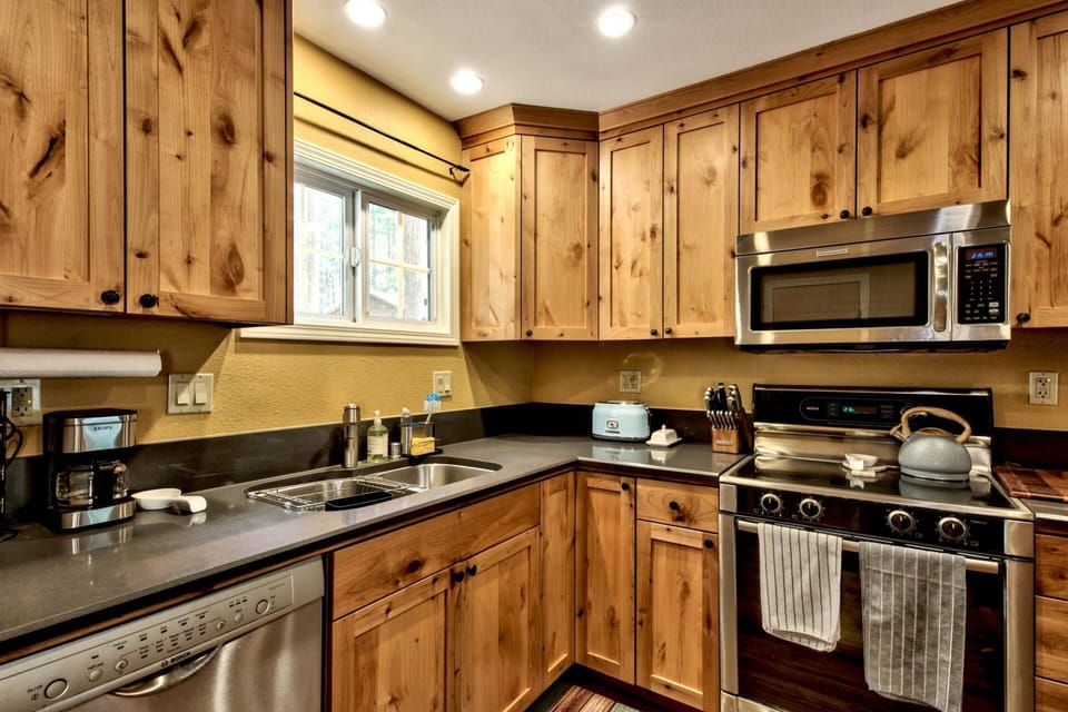 New granite and Appliances Kitchen and Living room together to enjoy friends and family