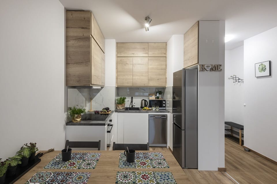 Comfort Apartment | Private kitchen | Full-size fridge, microwave, oven, stovetop