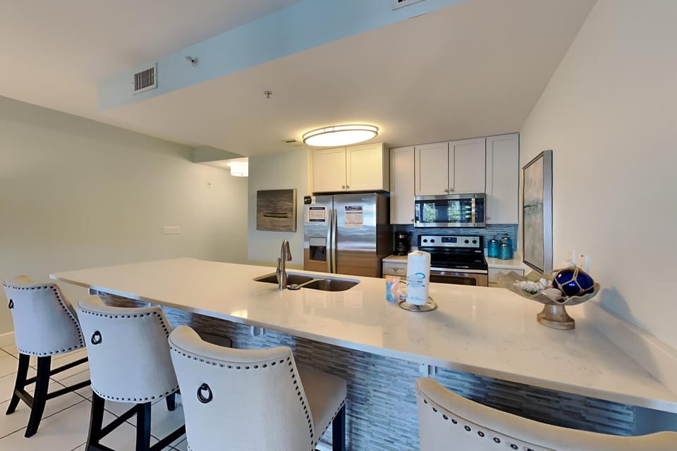 Condo, Multiple Beds, Balcony, Beach View | Private kitchen | Fridge, microwave, oven, stovetop