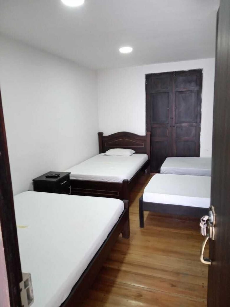 Family Quadruple Room, 1 Bedroom, Smoking, City View | Hypo-allergenic bedding, memory foam beds, iron/ironing board, free WiFi
