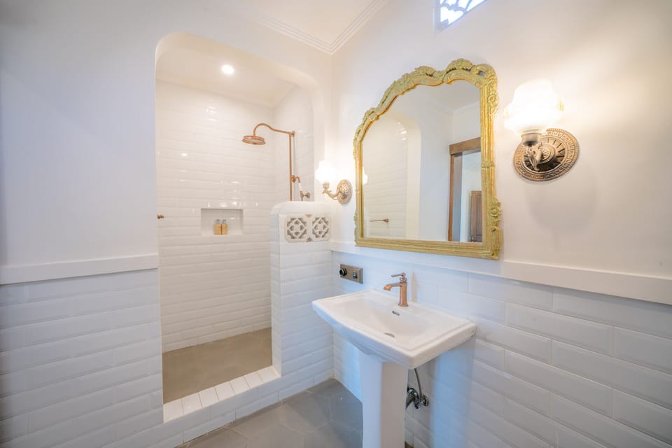 Deluxe Room, Multiple Beds, Non Smoking | Bathroom | Shower, hydromassage showerhead, bidet, towels