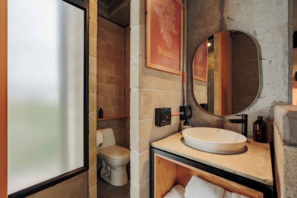 Basic Double Room | Bathroom | Shower, rainfall showerhead, towels, soap