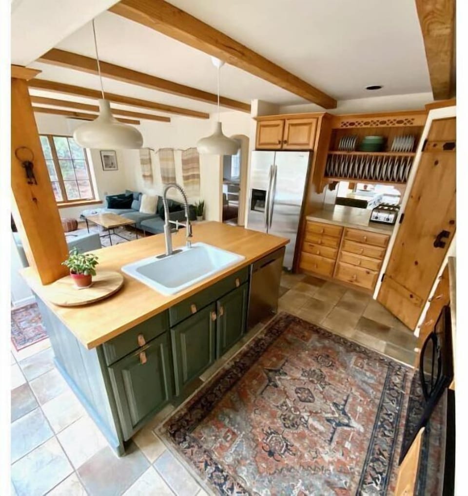 Dishwasher and InSinkErator garbage disposal.