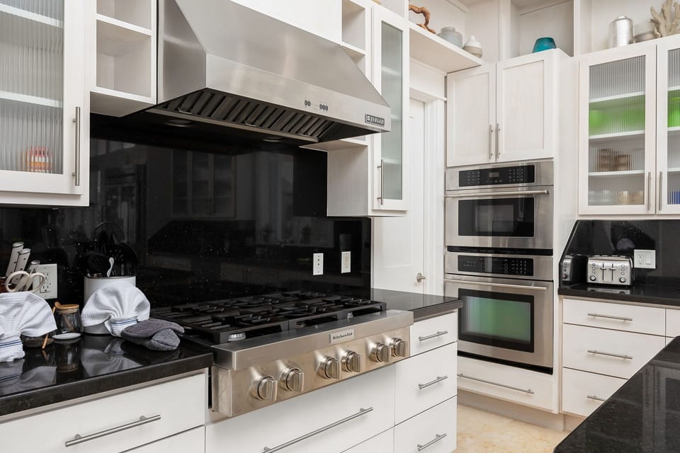 Fully stocked with pots, pans, and cookware to prepare a home cooked meal