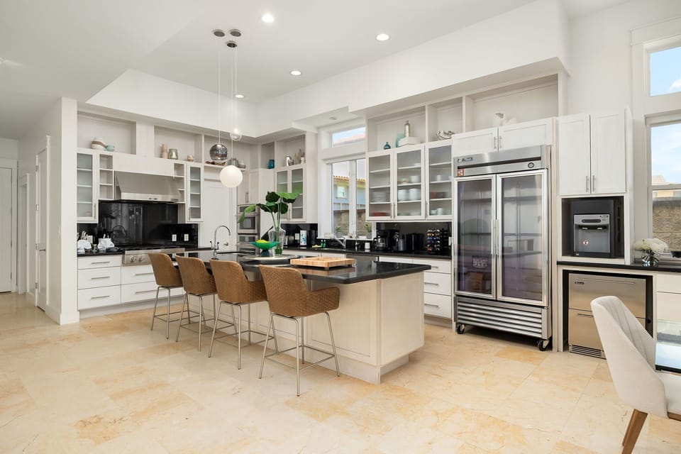 Fully stocked kitchen with extra seating for up to 4 guests