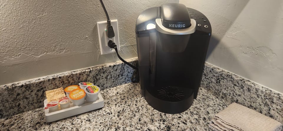 Coffee maker.  Coffee and Tea provided 