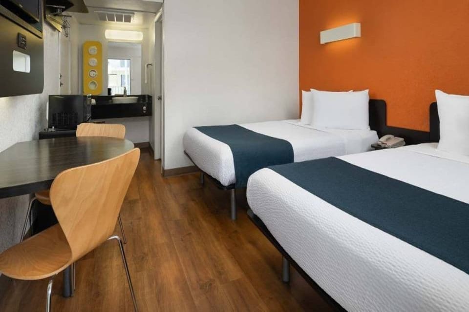 Blackout drapes, WiFi (free), bed sheets