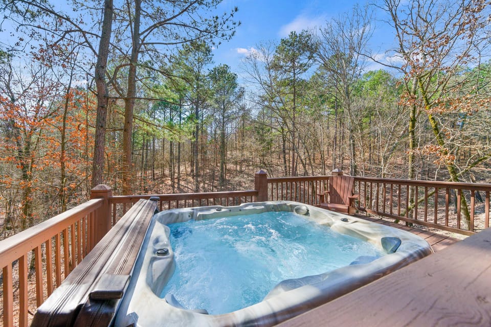 Take in the forest views and unwind in the private outdoor hot tub.