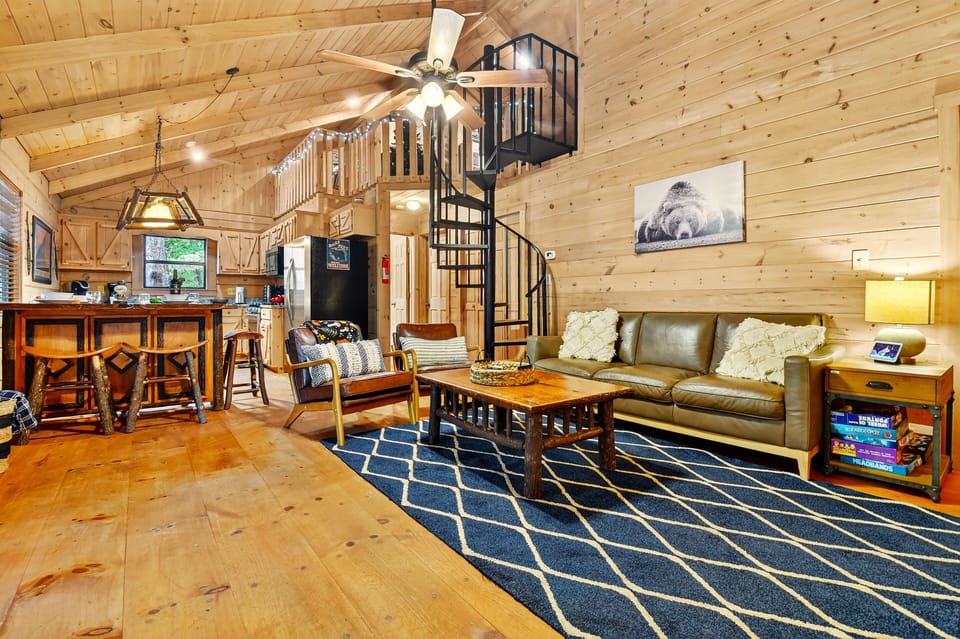 Experience togetherness with an airy floor plan connecting the living, dining, and kitchen areas.