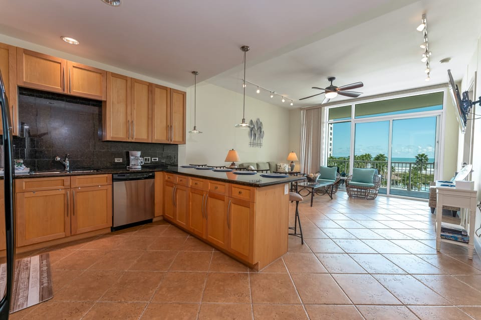 Escape the confines of a cramped living space and indulge in the spacious luxury of your dream beach vacation getaway!