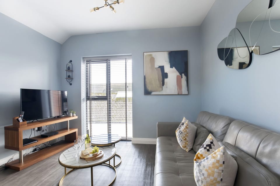 Apartment | Living area | 50-inch Smart TV with cable channels, Netflix, DVD player
