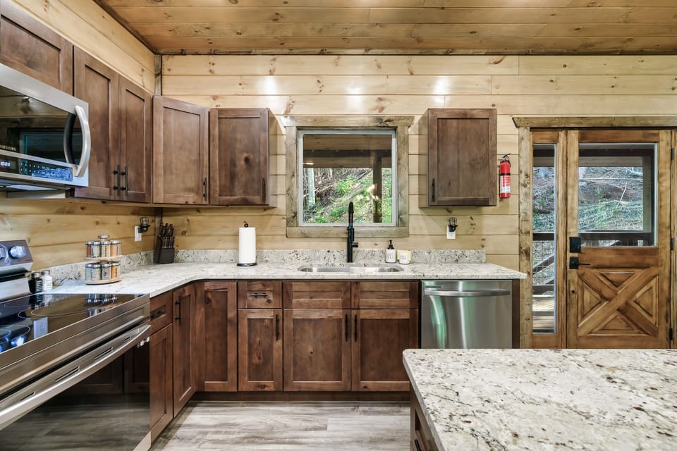 Huge Sink and Cabinets full of Cookware, Dishware, and Appliance