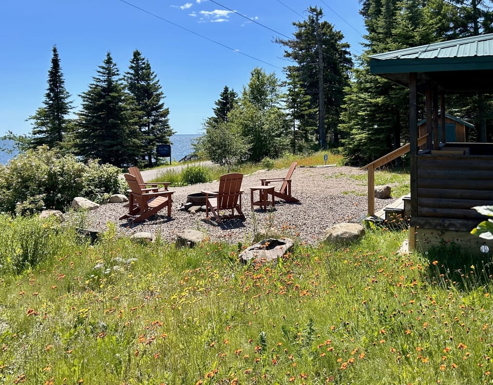 Gorgeous Lake views from your private firepit. Note Eve's Place sign and stairs to beach in distance