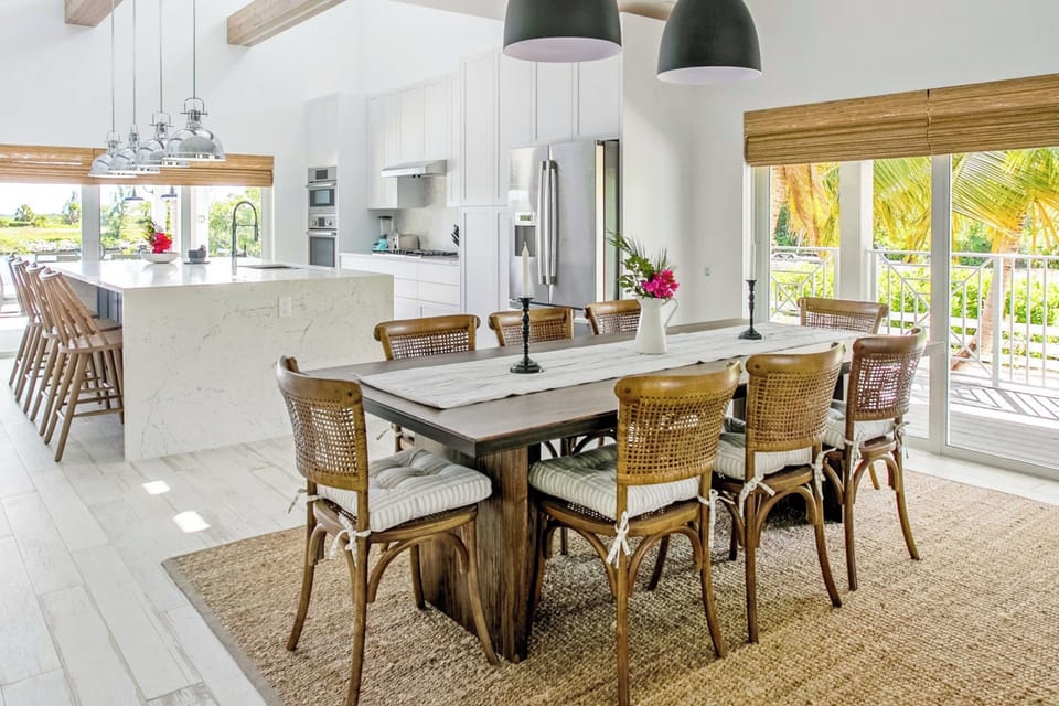 Formal dining table with seating for six guests. 