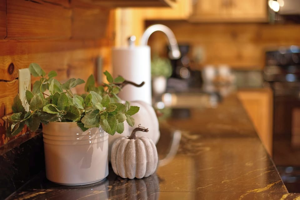 Charming touches add warmth and elegance to the kitchen space.