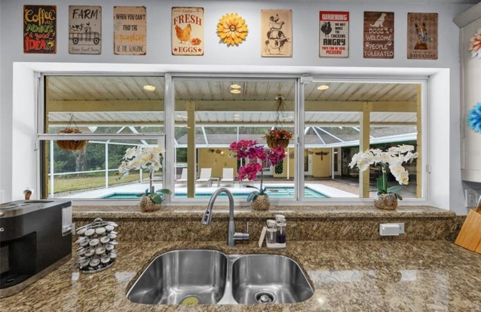 Be the cooking chef enjoying the view on the pool.