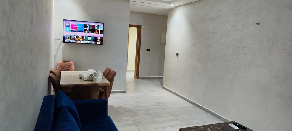 Family Apartment | Living area | 43-inch flat-screen TV with satellite channels