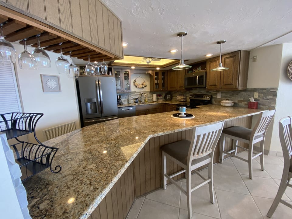 Open kitchen with breakfast bar