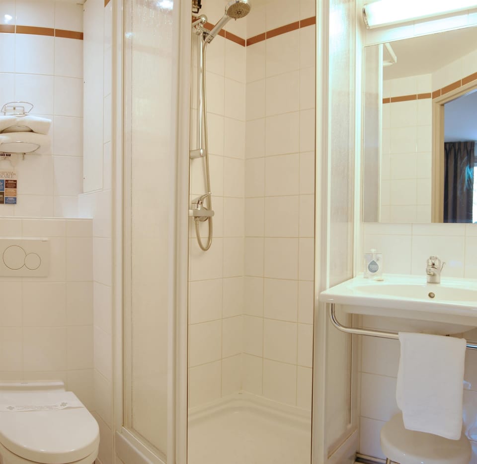 Shower, eco-friendly toiletries, hair dryer, towels