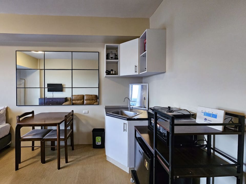 Comfort Condo, 1 Double Bed with Sofa bed, Refrigerator & Microwave, City View | Private kitchen | Shared fridge, microwave