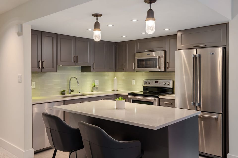 Modern cabinetry and high-end appliances make this kitchen both beautiful and practical.