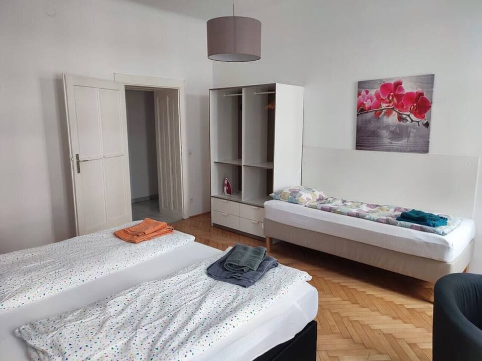 In this room, you`ll discover your comfortable bed and a serene atmosphere, all thanks to Arbio Designers` skillful touch.