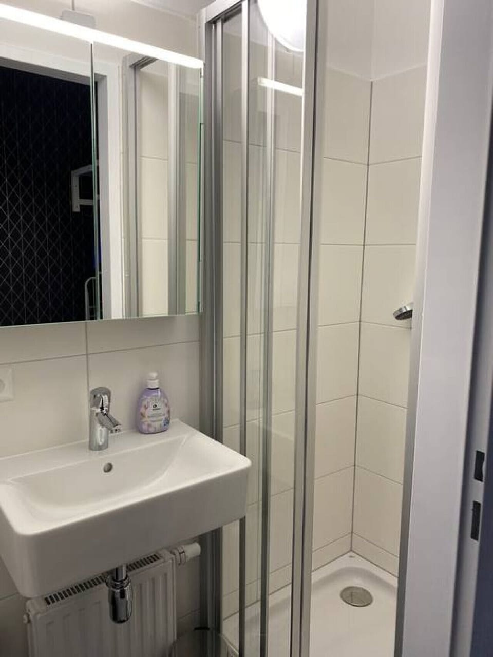 In this room, you`ll find the essentials: a toilet, sink, and a refreshing shower or bathtub, all designed by Arbio Designers for both functionality and aesthetics.