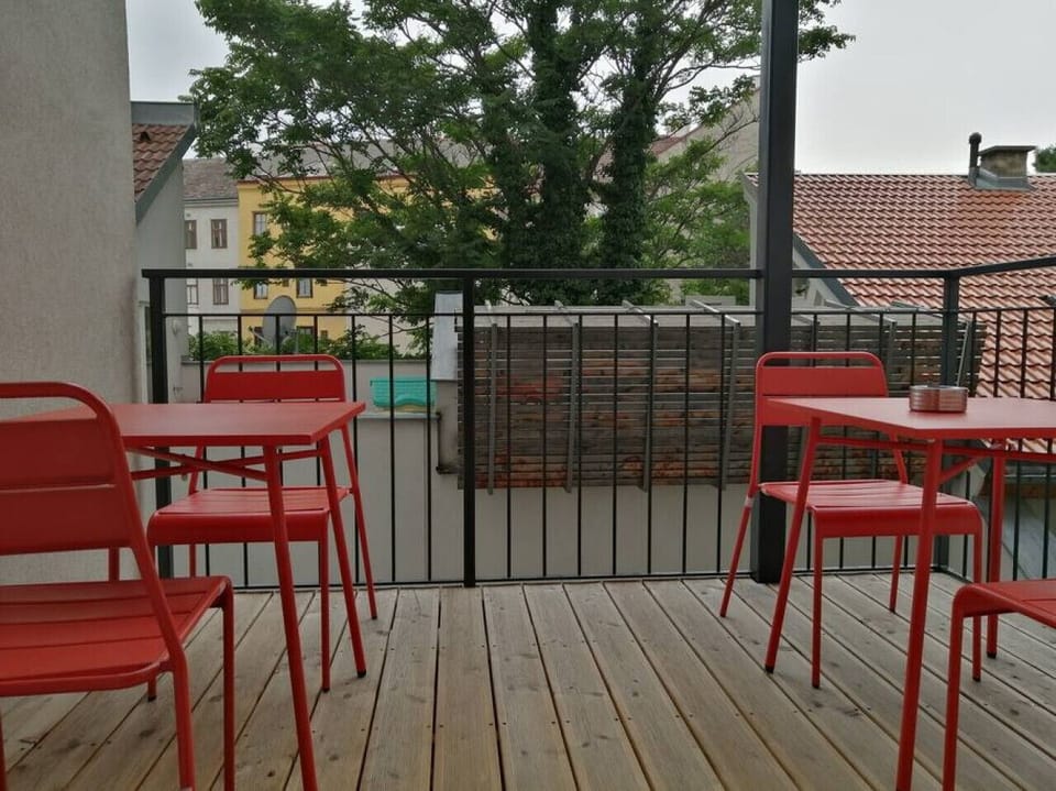 Step out onto the balcony, an outdoor oasis designed by Arbio Designers, where you can bask in the fresh air and scenic beauty.