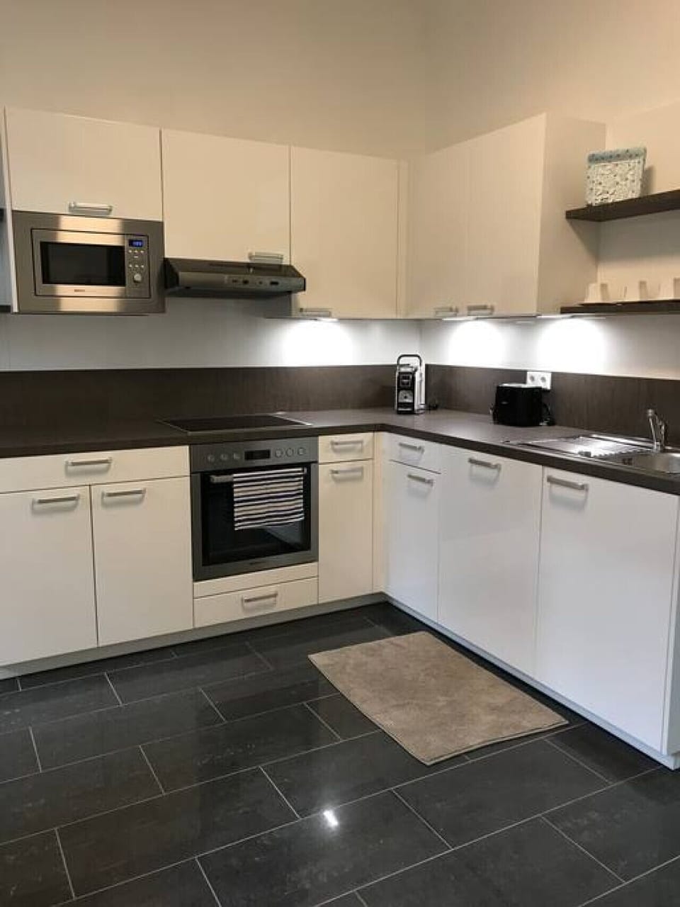 Step into the kitchen, where Arbio Designers have created a culinary haven, blending functionality and style seamlessly.