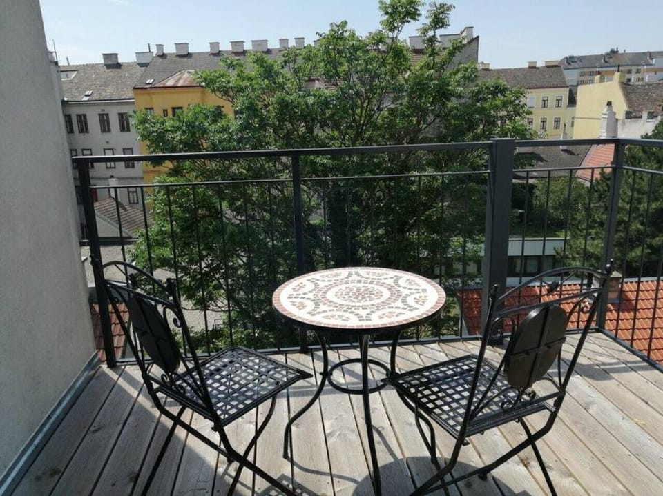 Step out onto the balcony, an outdoor oasis designed by Arbio Designers, where you can bask in the fresh air and scenic beauty.