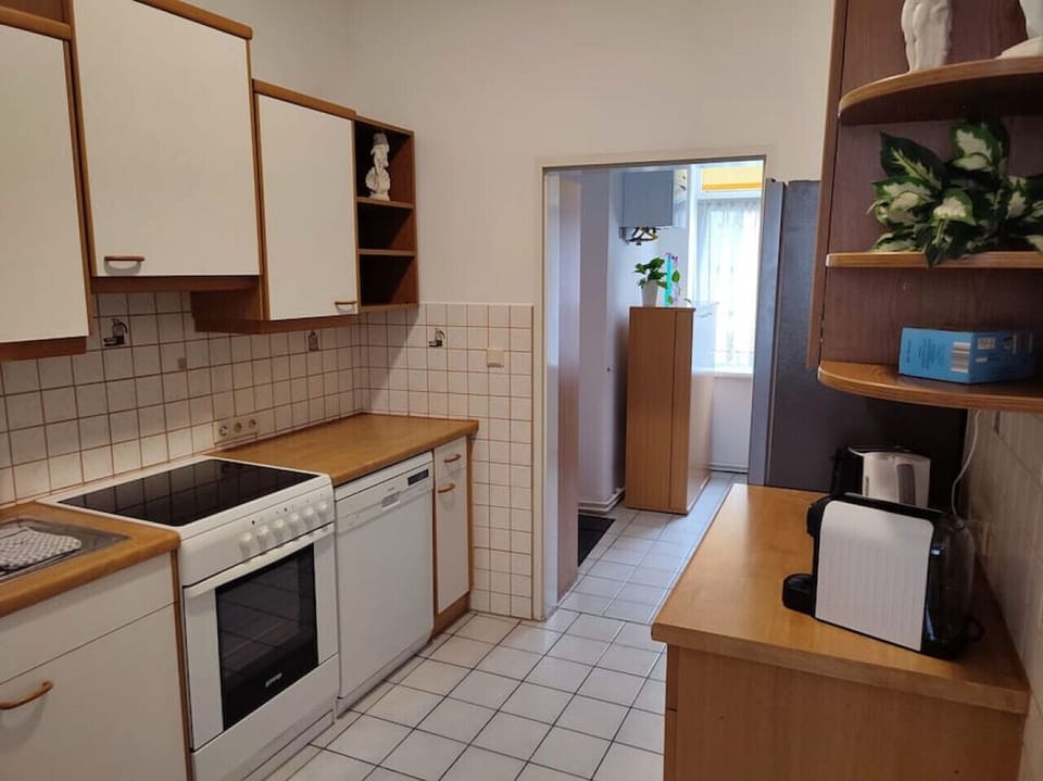 Step into the kitchen, where Arbio Designers have created a culinary haven, blending functionality and style seamlessly.