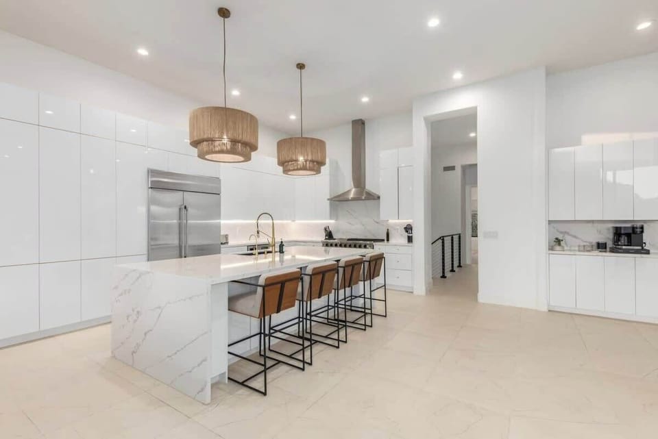 Open Concept Kitchen with Marble Island with Seating