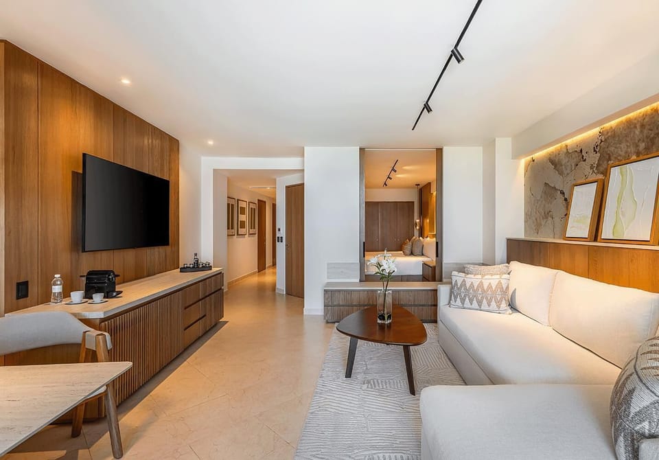 Premium bedding, down comforters, minibar, in-room safe